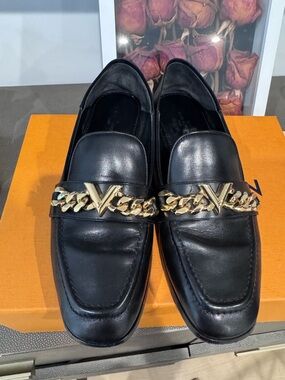 Louis Vuitton Black Leather Loafers with Gold Chain Accent